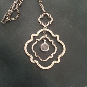 Envious stamped - silver tone .
